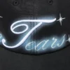Gorra con el logotipo de DT pintado con aerógrafo