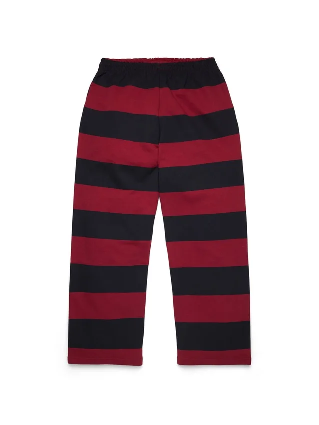 Pantalón de chándal a rayas con escudo y bajo abierto, rojo/azul marino
