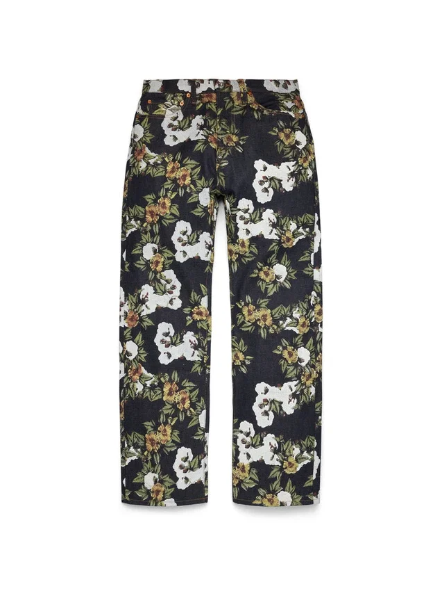 Pantalones holgados de Denim con estampado floral y ribete