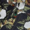 Pantalones holgados de Denim con estampado floral y ribete