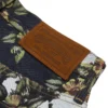 Pantalones holgados de Denim con estampado floral y ribete