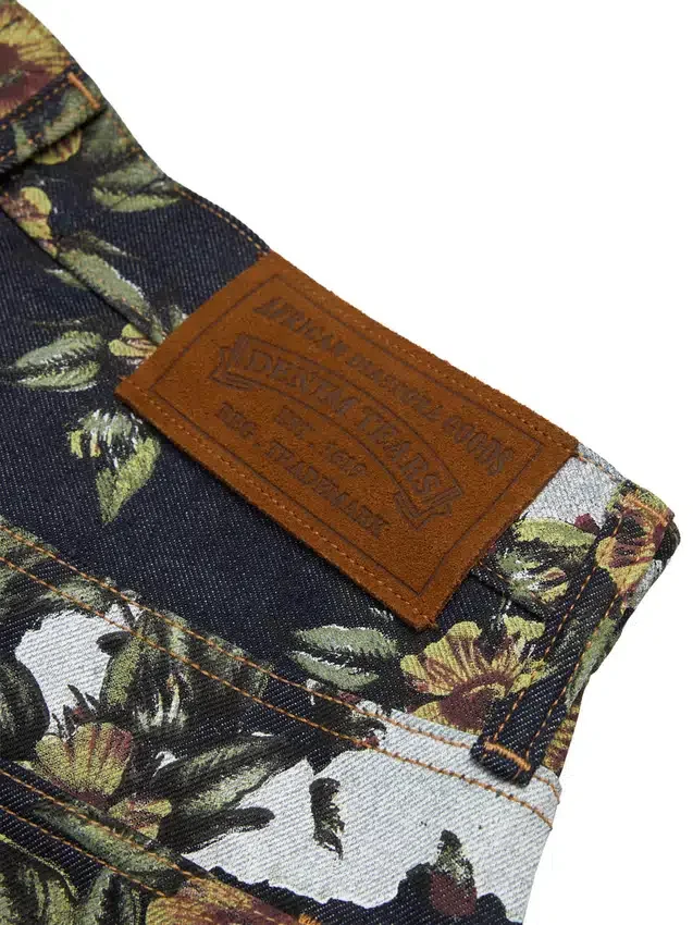 Pantalones holgados de Denim con estampado floral y ribete