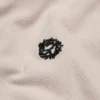 Polo «Peace Wreath» color crema