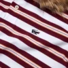 Polo rojo con cuello de piel de pantera